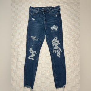Dark blue ripped jeans